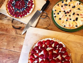 High angle view of strawberries in plate on table