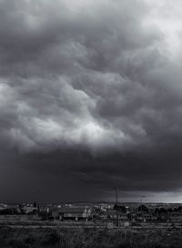 View of landscape against cloudy sky