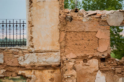 Old brick wall by building