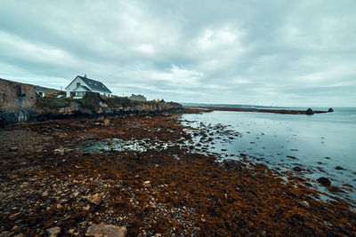 Scenic view of the rocky coast of inishmore during low tide