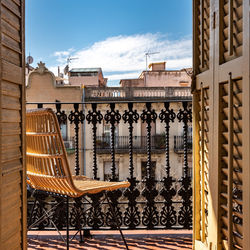 Buildings seen through balcony