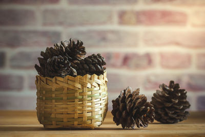 Close-up of pine cone on table