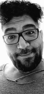 Portrait of young man wearing eyeglasses