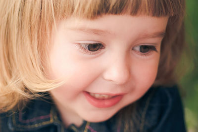 Close-up portrait of a smiling girl