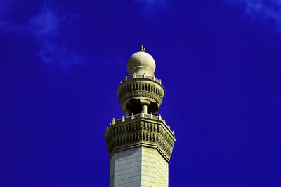 Low angle view of building against blue sky