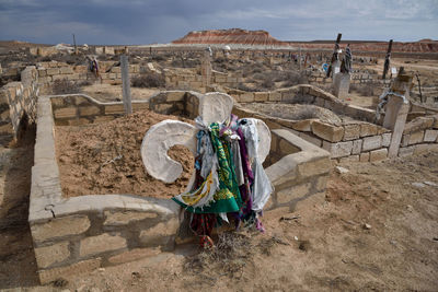 Rear view of people on the wall of a building