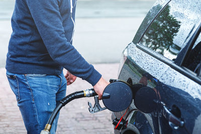 Low section of man riding bicycle