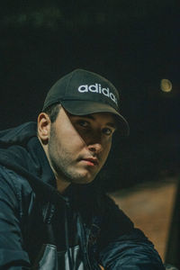 Portrait of young man wearing hat