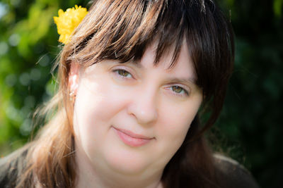 Close-up portrait of a smiling woman