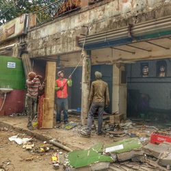 People working in abandoned building