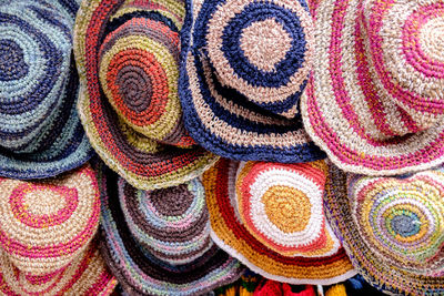 Full frame shot of colorful hats for sale at market