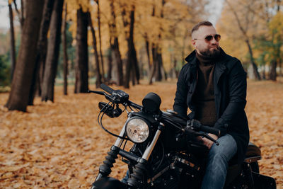 Young man riding motorcycle