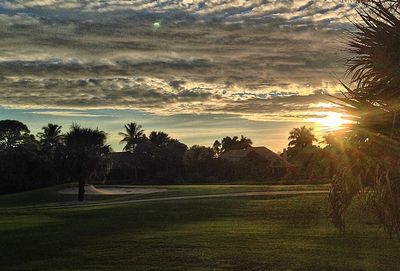 Scenic view of landscape against sky during sunset