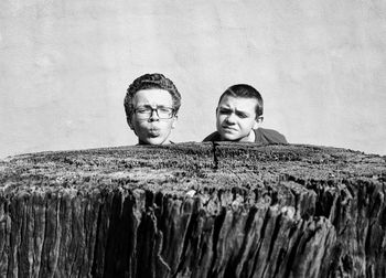 Portrait of man against wall