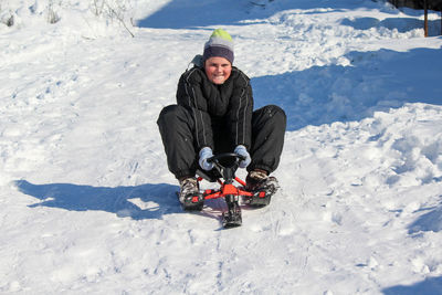 Full length of girl in snow