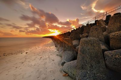 Scenic view of beach during sunset