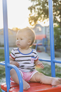 Portrait of cute baby boy at playground