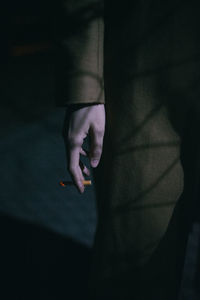 Close-up of woman hand with shadow