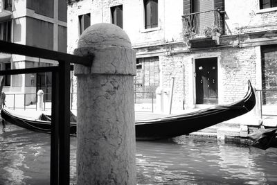 Close-up of boat moored in water