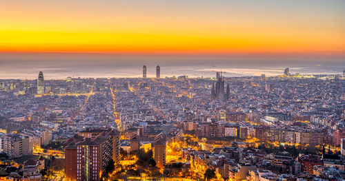 Barcelona with the mediterranean sea before sunrise