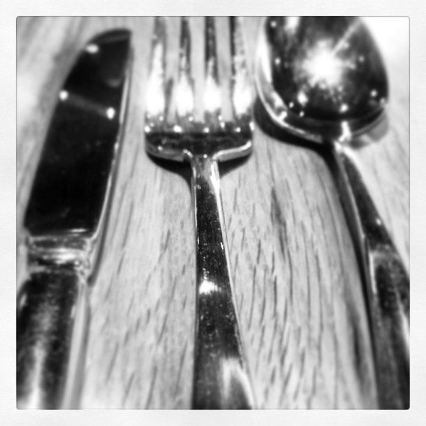 close-up, transfer print, indoors, metal, auto post production filter, focus on foreground, selective focus, still life, metallic, old-fashioned, table, no people, handle, old, single object, faucet, wood - material, glass - material, day, shiny