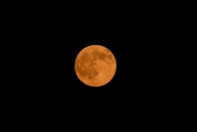 Low angle view of moon in sky