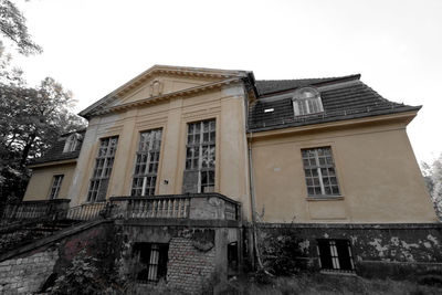 Exterior of old building against clear sky