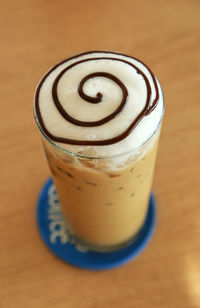 High angle view of drink in glass on table