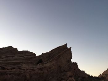 Low angle view of mountain against clear sky