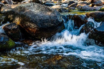 Water flowing over rocks in stream eastern sierra nevada mountains 