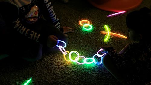 High angle view of multi colored light painting at night