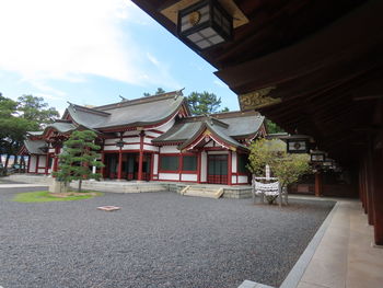 Exterior of houses and buildings against sky