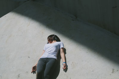 Close-up of woman standing in pond