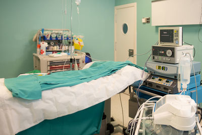 Rear view of man working at clinic