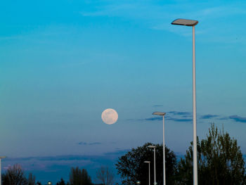 View of street light against blue sky