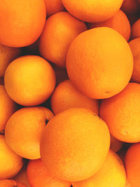 Full frame shot of oranges at market stall