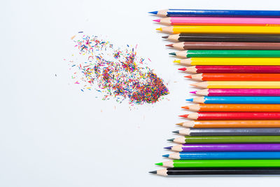 High angle view of multi colored pencils on table