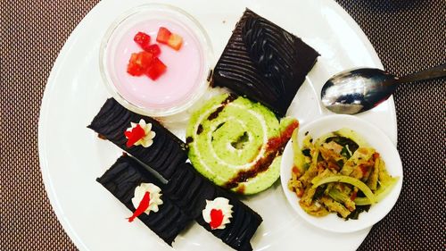 Close-up of served food on table