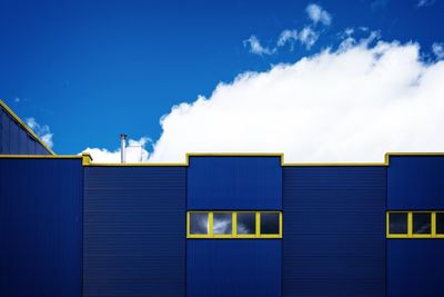 Blue building against sky