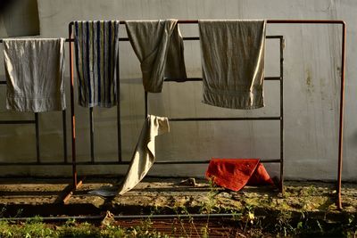 Clothes drying against wall