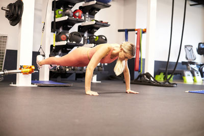 A woman working out at the gym.