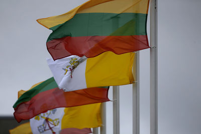 Low angle view of flag against the sky