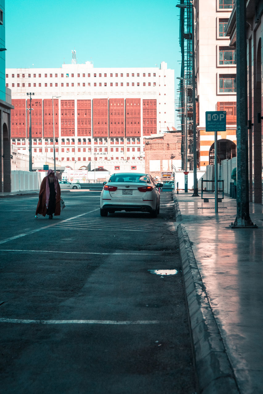 VIEW OF CITY STREET AND BUILDINGS