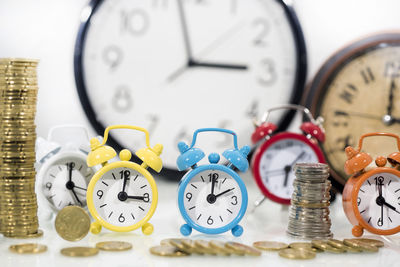 Close-up of clock on table