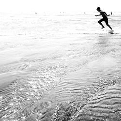 Man surfing in sea