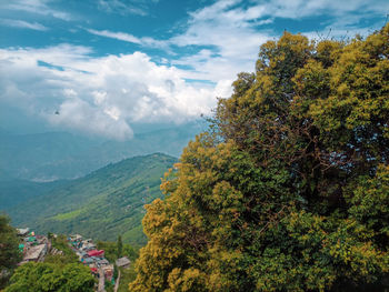 High angle view of trees and mountains against sky