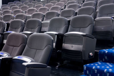 Empty chairs in movie theater