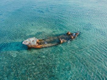 High angle view of abandoned boat in sea