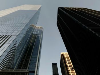 Low angle view of modern buildings against clear sky