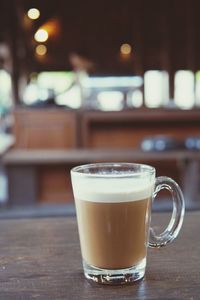 Close-up of coffee served on table